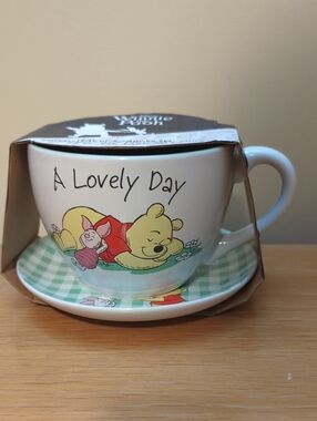 Disney Winnie the Pooh 'A Lovely Day' Mug and Saucer set brand new